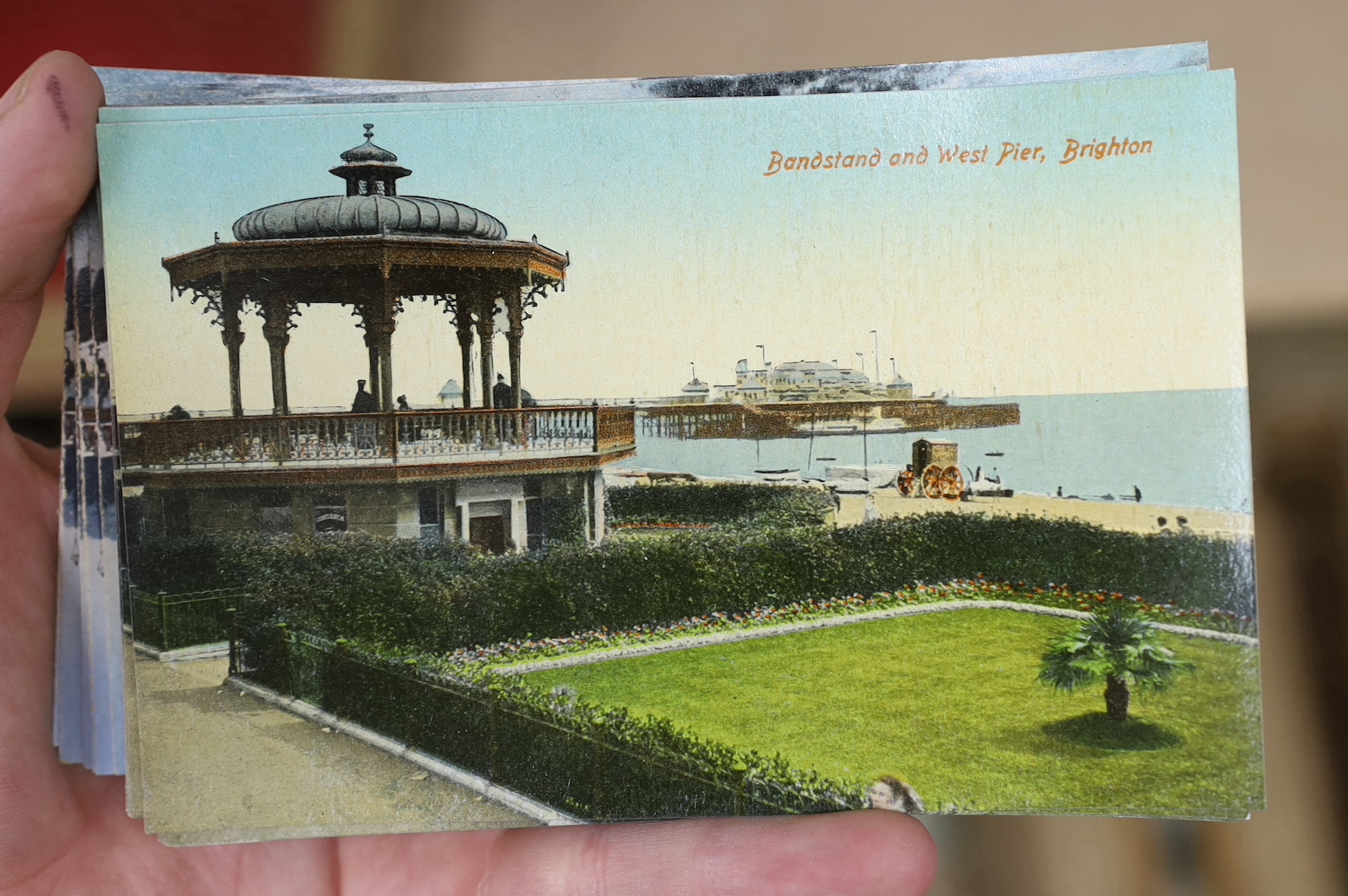 A large quantity of unused local postcards of Brighton